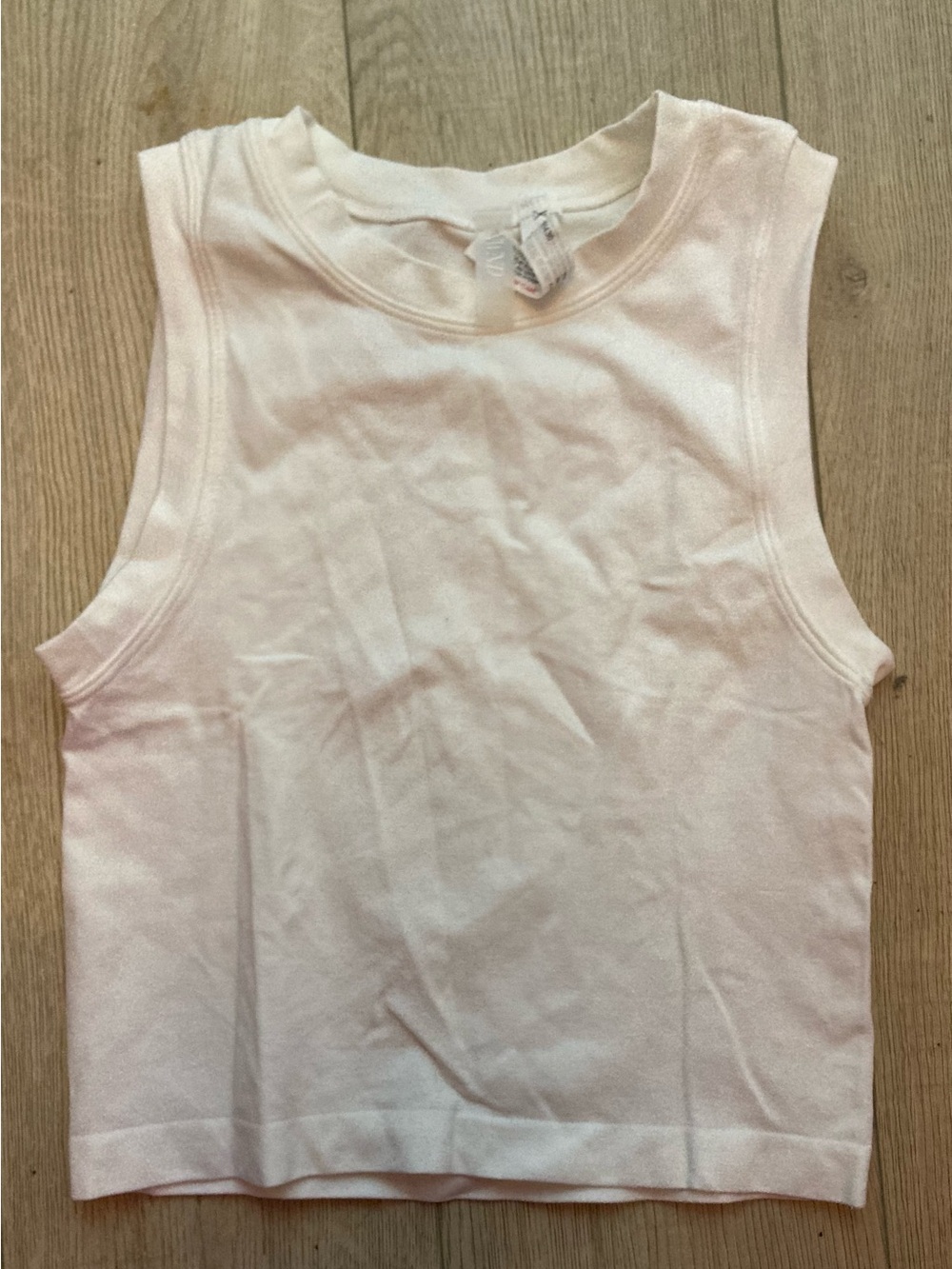 White Ribbed Tank with Visible 'AND' Logo Detail